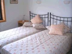 Bedroom at Casa Santa Rita Cottages - Self catering accommodation overlooking the ocean